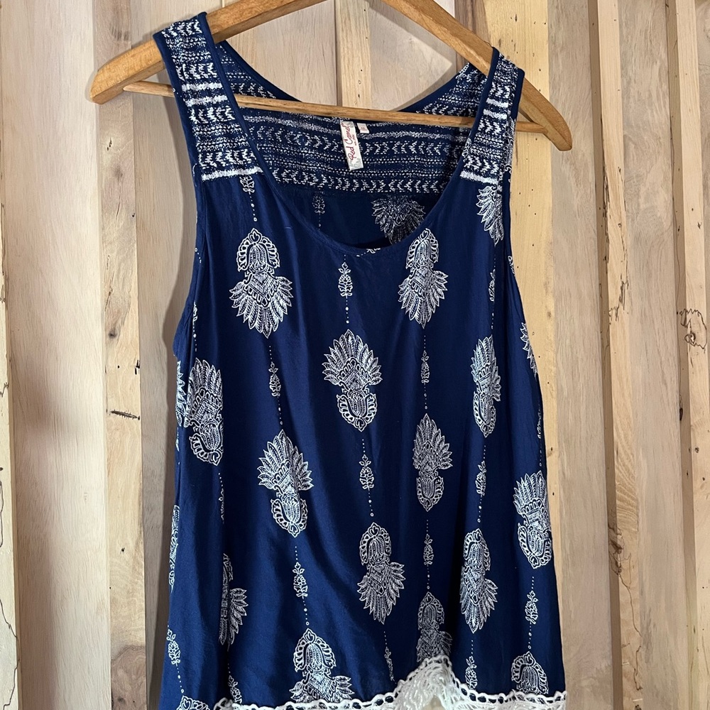Navy Blue Sleeveless Top with White Pattern